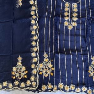 Unstitched punjabi suits.